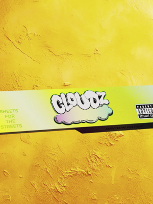 Neon lime box with graffiti-style cloud logo reading 'GLOOZ' or similar, text 'SHEETS FOR THE STREETS' on a bright yellow wall behind it.