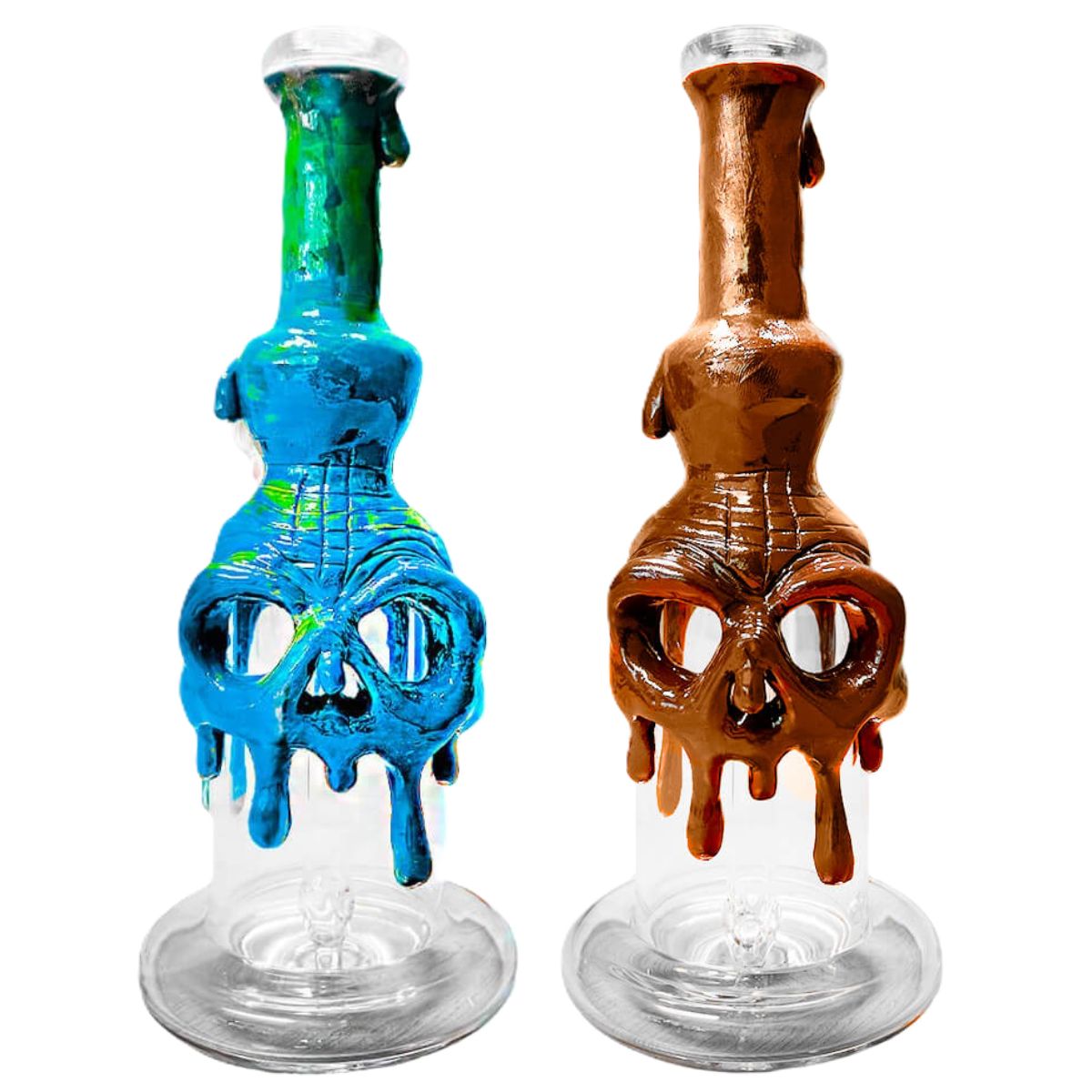 Two skull-shaped glass bongs with colorful melted-drip designs, blue on the left and brown on the right, against a white background.